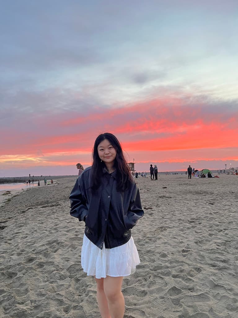 Anna Katherine at the beach at sunset