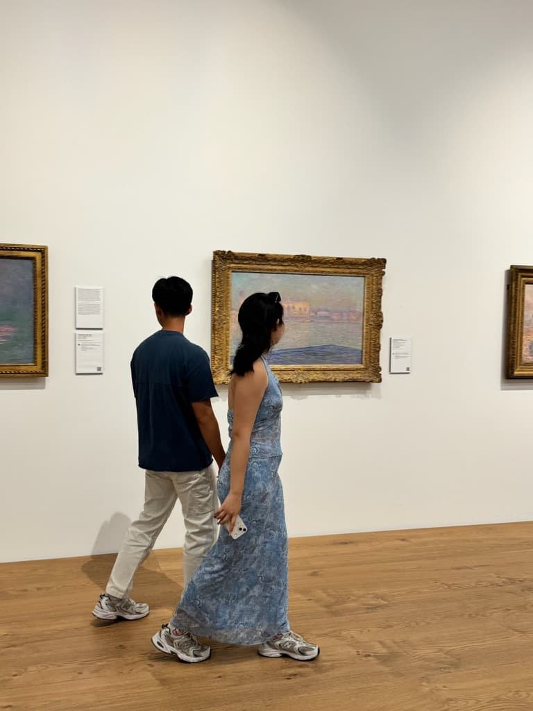 Walking through a museum gallery